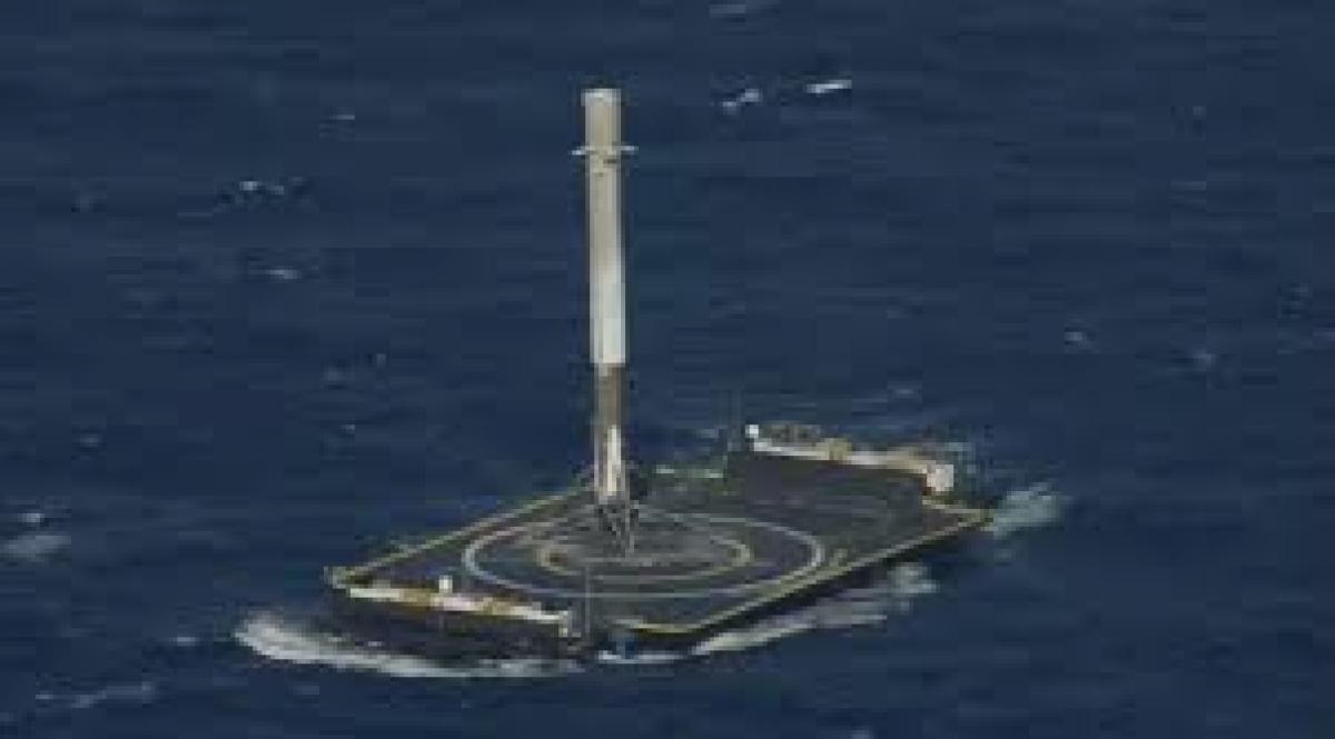 SpaceX lands first stage of Falcon 9 rocket on drone ship in Atlantic Ocean